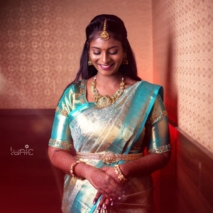 bridal photography poses 21 Traditional South Indian bride in teal blue silk saree looking down shy pose Salem Tamil Nadu